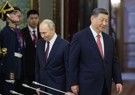 2025年5月8日、ロシア大統領府（クレムリン）で会談に臨むロシアのプーチン大統領と中国の習近平国家主席。Yuri Kochetkov/Pool via REUTERS