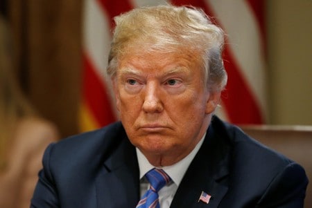 ７月２０日、トランプ米大統領は利上げが米国の競争力を奪い、米経済に打撃を与える可能性があるとして、ＦＲＢの金融政策をあらためて批判した。写真は７月１８日、ワシントンで撮影（２０１８年　ロイター/Leah Millis）