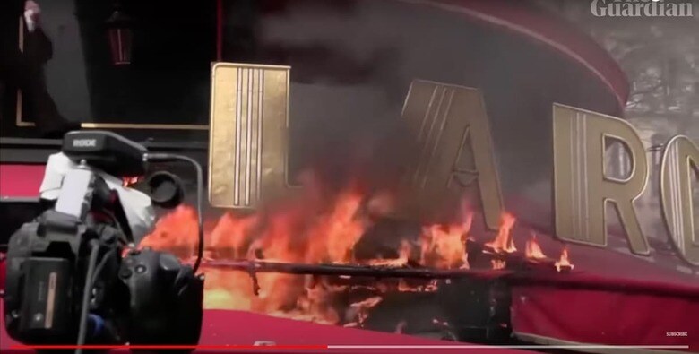 年金改革に対する全国的な抗議活動が続くフランスで6日、マクロン大統領が2017年の大統領選挙第1次投票の勝利を祝ったことで知られるパリのカフェ「ラ・ロトンド」近くで警官との衝突が発生した。Guardian News / YouTube