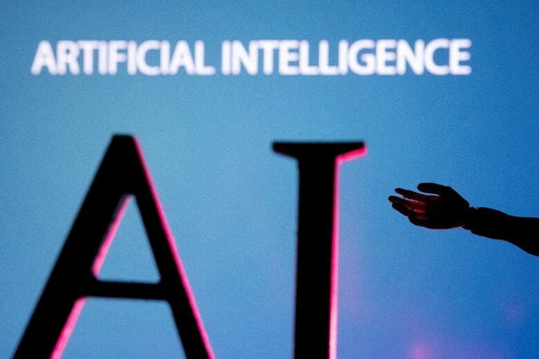 AI（人工知能）のイメージ。2023年6月撮影。 REUTERS/Dado Ruvic