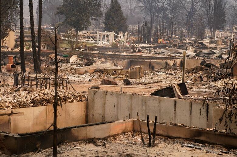 8月3日、米ワシントン州スポケーンで発生した山火事で焼け落ちた住宅街。 REUTERS/David Ryder