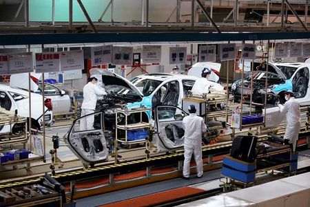 中国の国家市場監督管理総局は２９日、ホンダがハイブリッド車（ＨＶ）２０万台超をリコール（回収・無償修理）すると発表した。写真は東風本田汽車の武漢工場。１８年４月撮影。（2022年 ロイター/Aly Song）