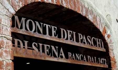 FILE PHOTO: The entrance to Italian bank Monte Dei Paschi di Siena is seen in San Gusme near Siena, Italy, September 29, 2016.  REUTERS/Stefano Rellandini/File Photo