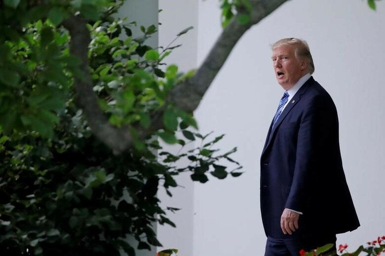 ７月１７日、米国のトランプ大統領（写真）は、米製造業の保護に向け今後６カ月間でさらなる法的・規制措置を講じる考えを示すとともに、米企業に損害をもたらす貿易協定や慣行を非難した。６月撮影（２０１７年　ロイター/Carlos Barria）