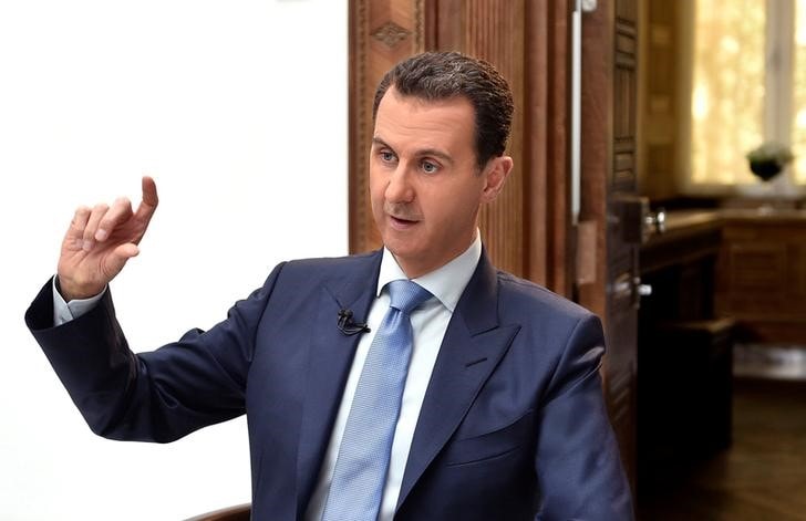 ４月９日、米国のシリア攻撃により、アサド大統領（写真）の戦術はやや慎重化するかもしれないが、反体制派の一掃に向けた同盟国との軍事作戦を弱めることはなさそうだ。ダマスカスで撮影。ＳＡＮＡ６日提供（２０１７年　ロイター/SANA/Handout via REUTERS）