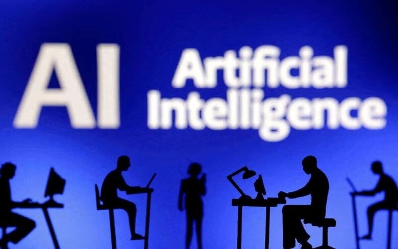 FILE PHOTO: Figurines with computers and smartphones are seen in front of the words \"Artificial Intelligence AI\" in this illustration taken, February 19, 2024. REUTERS/Dado Ruvic/Illustration/File Photo