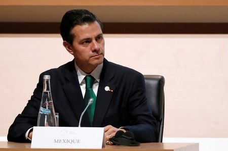 　５月２４日、メキシコのペニャニエト大統領の報道官は、北米自由貿易協定（ＮＡＦＴＡ）再交渉を妥結させるためにメキシコが米国の圧力に屈することはないと言明した。写真は気候変動サミットに出席する同大統領。昨年１２月にパリ近郊で代表撮影（２０１８年　ロイター）