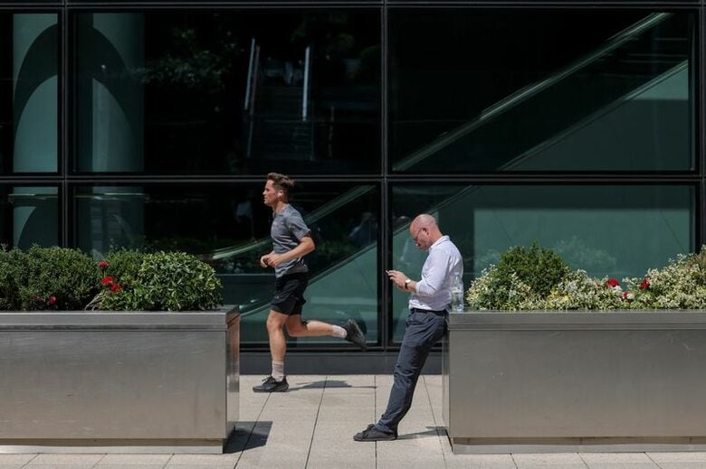 写真は2025年6月、英ロンドン、カナリーワーフのオフィス街で撮影。REUTERS/Kevin Coombs
