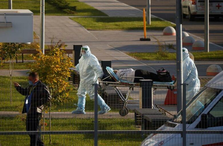 ロシアのプーチン大統領は10月12日、新型コロナウイルスのワクチン接種加速の必要性を強調した。モスクワの医療機関で6日撮影（2021年　ロイター/Maxim Shemetov）