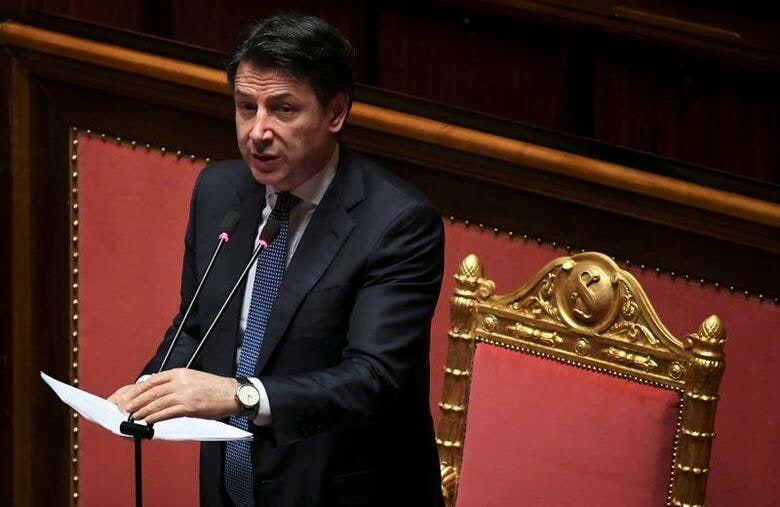 イタリアのコンテ首相（写真）、新型コロナウイルスの感染拡大を受けて、政府が企業を国有化することはないが、「黄金権限」を利用して戦略産業の株式の買い占めを防ぐと述べた。ローマで３月撮影（２０２０年　ロイター/Alberto Lingria）