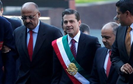 ７月７日、 メキシコ金融規制当局ＵＩＦ責任者のパブロ・ゴメス氏は記者会見で、ペニャニエト前大統領（写真）が関与した多額の海外送金について調査中だと発表した。メキシコシティで２０１８年１２月撮影（２０２２年　ロイター/Carlos Jasso）