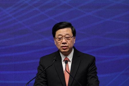 　香港の李家超（ジョン・リー）行政長官は２４日、香港政府は中国の対日外交政策を支持するとし、状況を注視し適切に対応すると述べた。４日撮影（２０２５年　ロイター／Tyrone Siu）