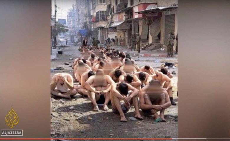 イスラム組織ハマスの当局者は８日、パレスチナ自治区ガザで拘束されたとされる数十人のパレスチナ人男性が下着姿で路上に並ばされている映像がソーシャル・メディアで拡散されたことを受け、イスラエル軍は「罪のない民間人に対する凶悪犯罪」を行っていると非難した。Al Jazeera English / YouTube
