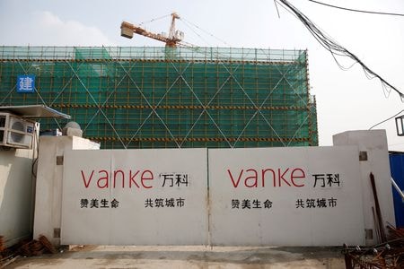中国の不動産開発大手、万科企業の祝九勝最高経営責任者（ＣＥＯ）が１５日、公安当局に拘束され、深セン政府のタスクフォースが事業運営を監督するため介入したと、経済観察報が１６日、関係者の話として報じた。写真は万科企業の建設現場。２０１７年３月、上海で撮影（２０２５年　ロイター/Aly Song）