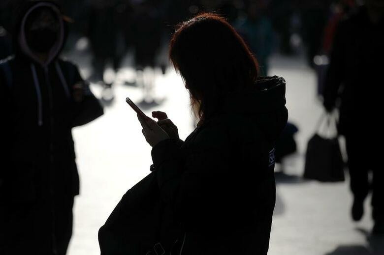 中国本土で、米国発の音声会員制交流サイト（SNS）アプリ「クラブハウス」の新規ユーザーが続々と増えている。北京で2018年2月撮影（2021年　ロイター/Damir Sagolj）