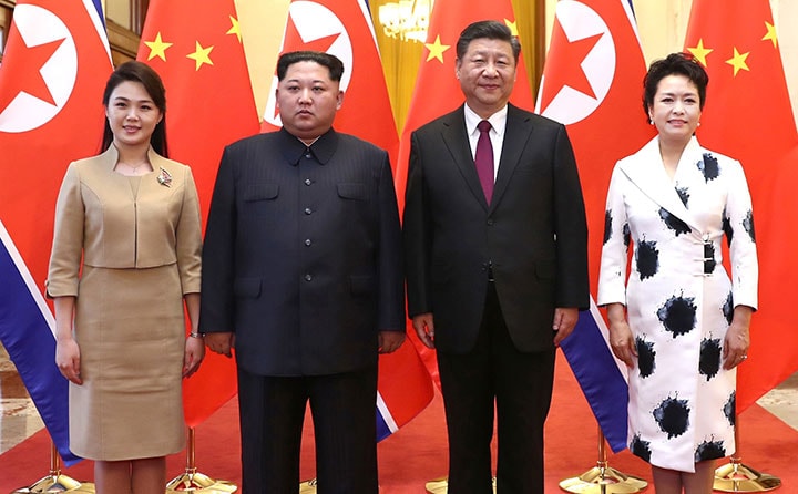右から中国の習近平国家主席夫妻と金正恩夫妻　Ju Peng/Xinhua/REUTERS