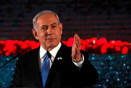 米ホワイトハウスは２３日、イスラエルのネタニヤフ首相が来週２８日にワシントンを訪問すると発表した。関係筋は、米当局者がネタニヤフ氏に対しトランプ大統領が内密に進めてきた中東和平案の一部詳細を説明する可能性があるとしている。エルサレムで代表撮影（２０２０年　ロイター）