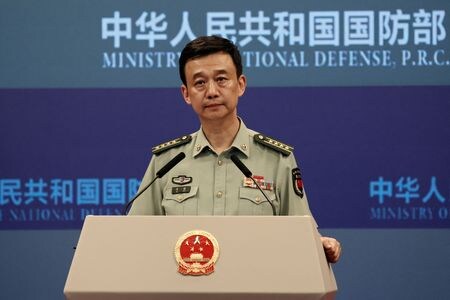 １２月２８日、 中国国防省は台湾が２週間後に迫った総統選挙を前に、中国の軍事的脅威を意図的に「誇張」していると非難した。写真は中国国防省のWu Qian報道官。北京で８月撮影（２０２３年　ロイター/Shubing Wang）