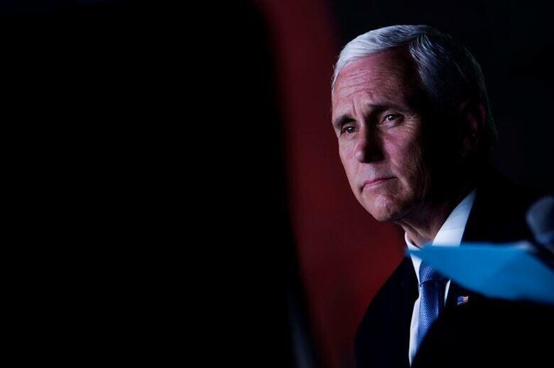 11月3日の米大統領選まで9日を残す中、ペンス副大統領は25日、複数の補佐官の新型コロナウイルス感染が判明したにもかかわらず、選挙戦を続行した。メリーランド州ベルツビルで6月5日撮影(2020年　ロイター/Eric Thayer)